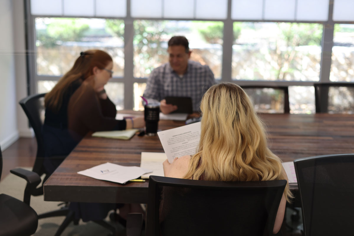 James Rosenblatt Team and Team of lawywers in a meeting, Around conference room in Rosenblatt office.